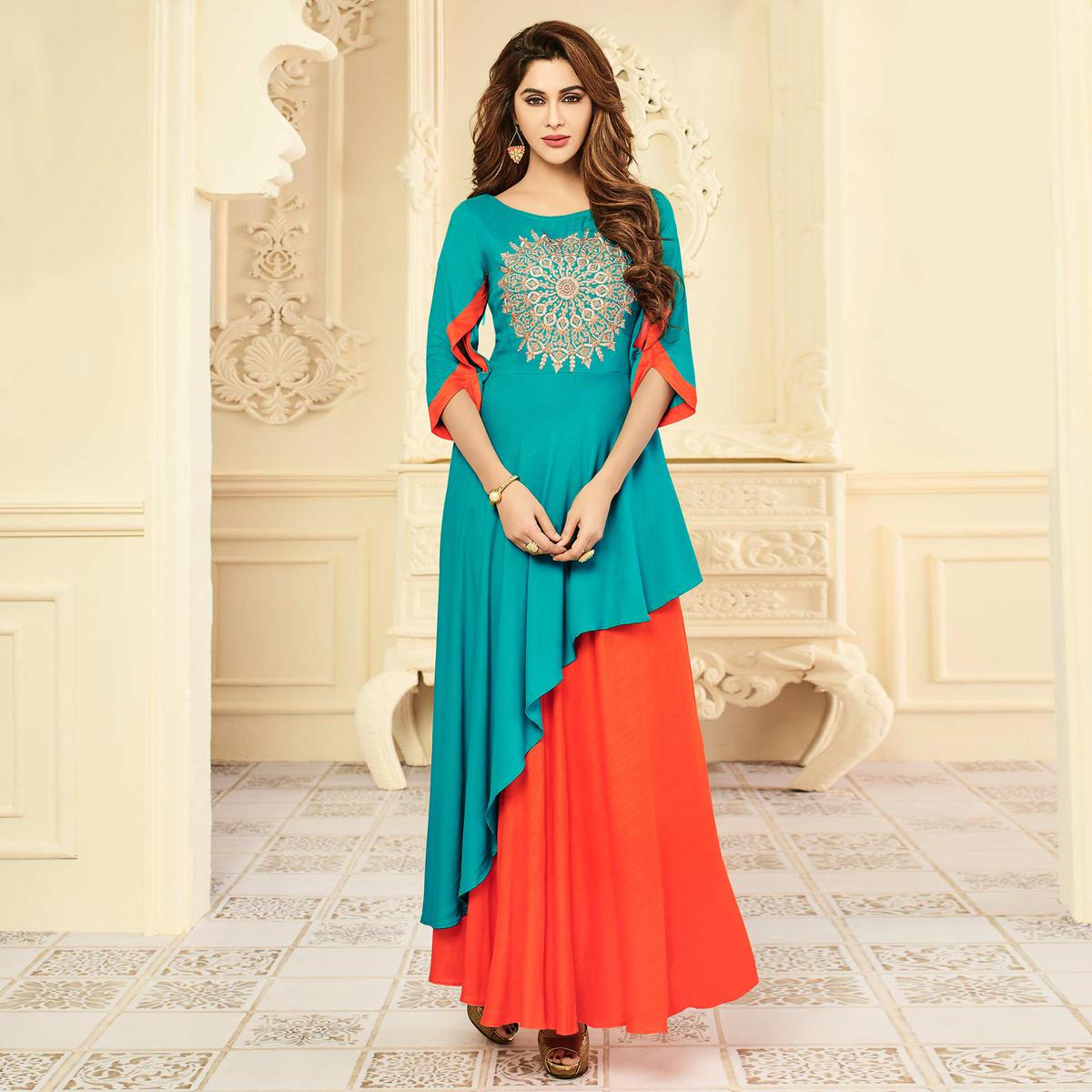 Entrancing Sky Blue-Orange Colored Party Wear Floral Embroidered Rayon Kurti
