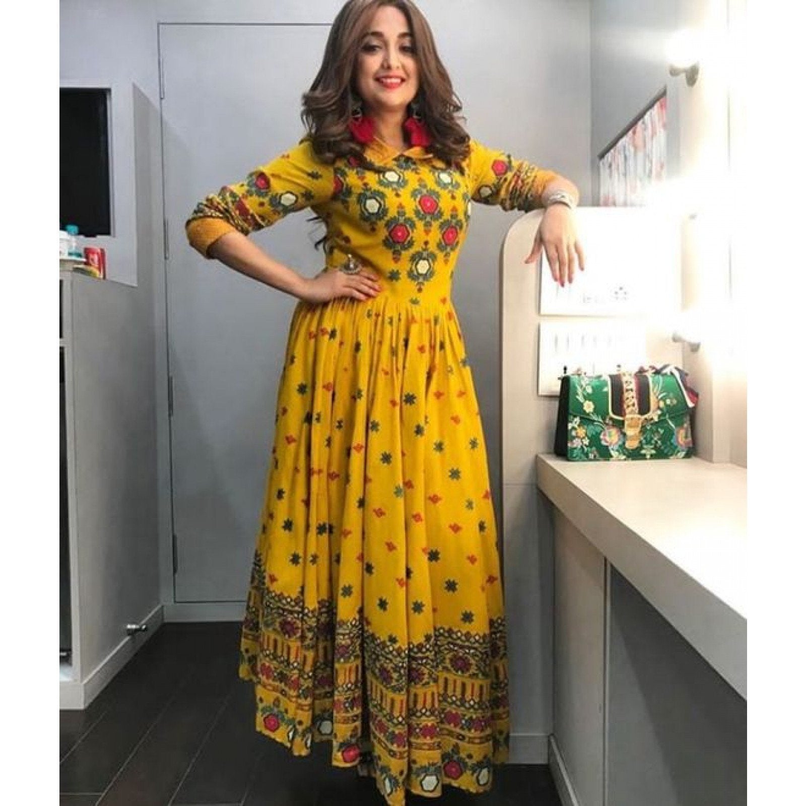 Attractive Mustard Color Long Printed Gown