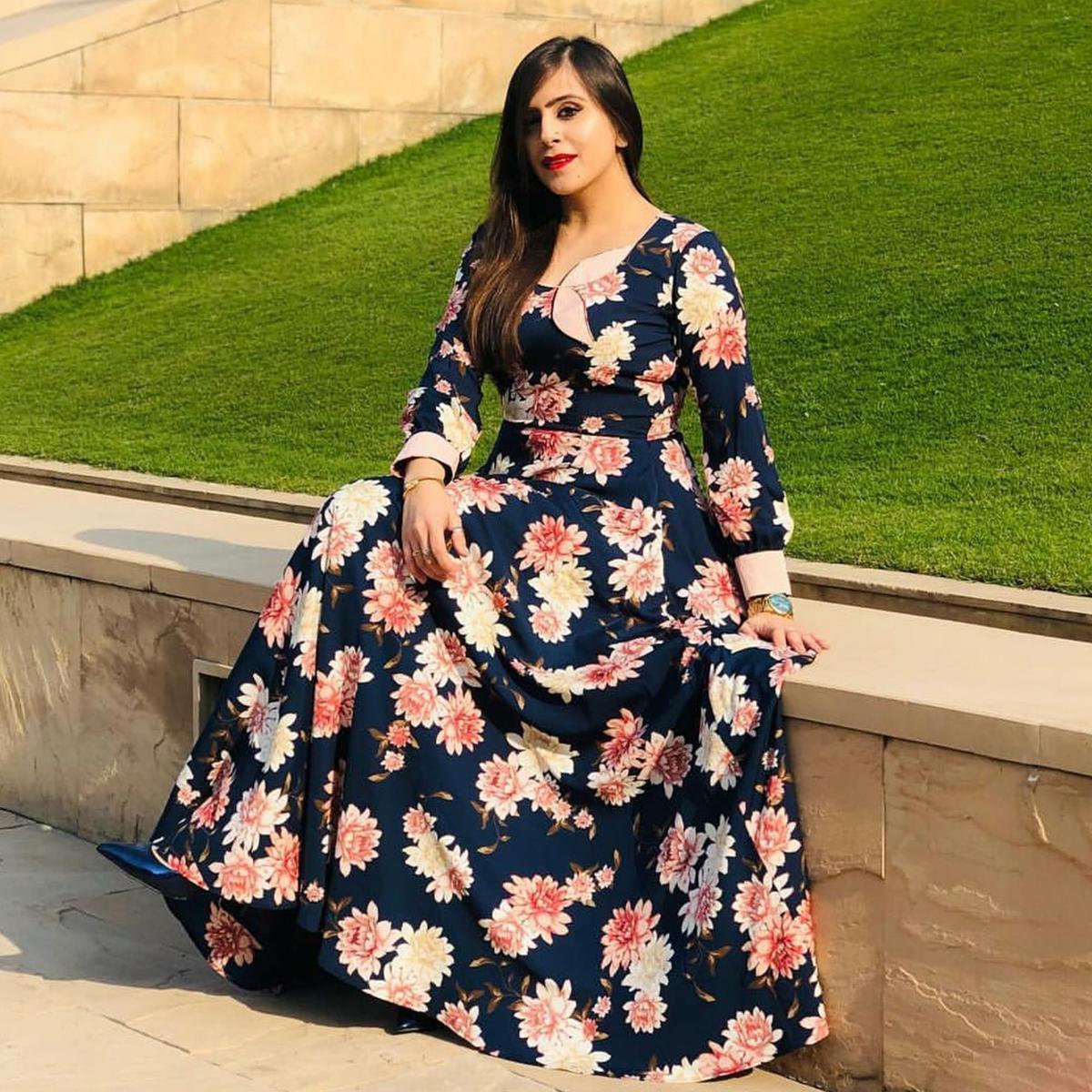 Staring Navy Blue Colored Partywear Printed Crepe Long Kurti