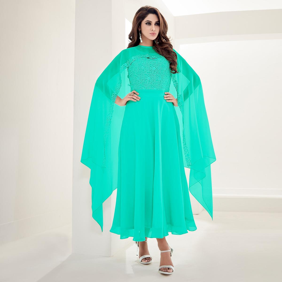 Flamboyant Aqua Green Colored Partywear Floral Embroidered Georgette Kurti