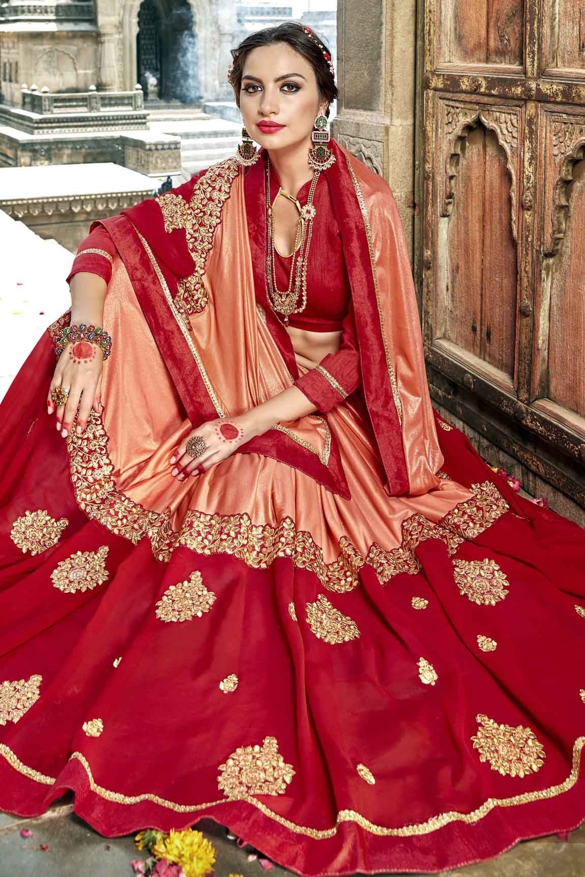 Fancy Fabric Peach & Red Embroidered With Stone Work Saree