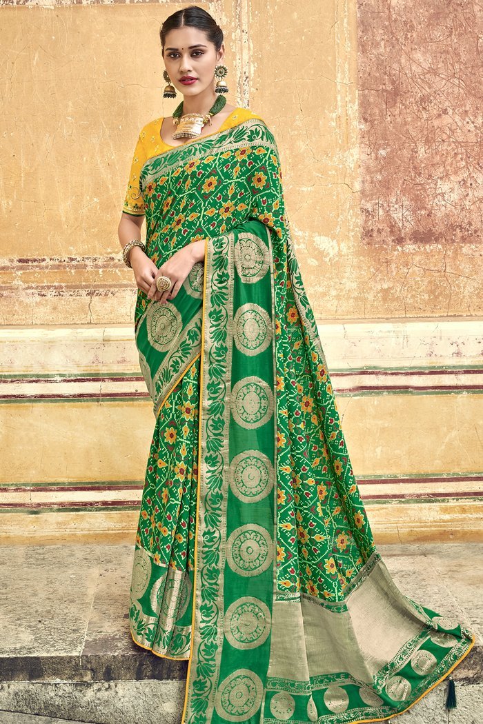GRASS GREEN WOVEN PATOLA SAREE WITH BANARASI BORDER AND DESIGNER EMBROIDERED BLOUSE